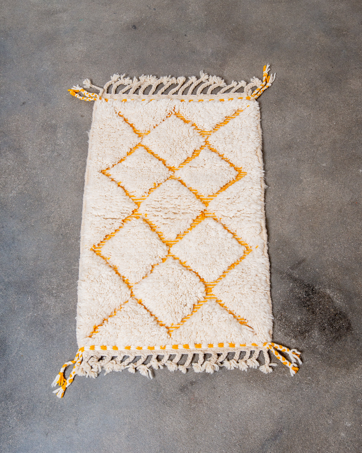 Modern, designer, handcrafted Berber rug from Morocco. Beniourain carpet with beautiful colours and patterns and fluffy wool texture.